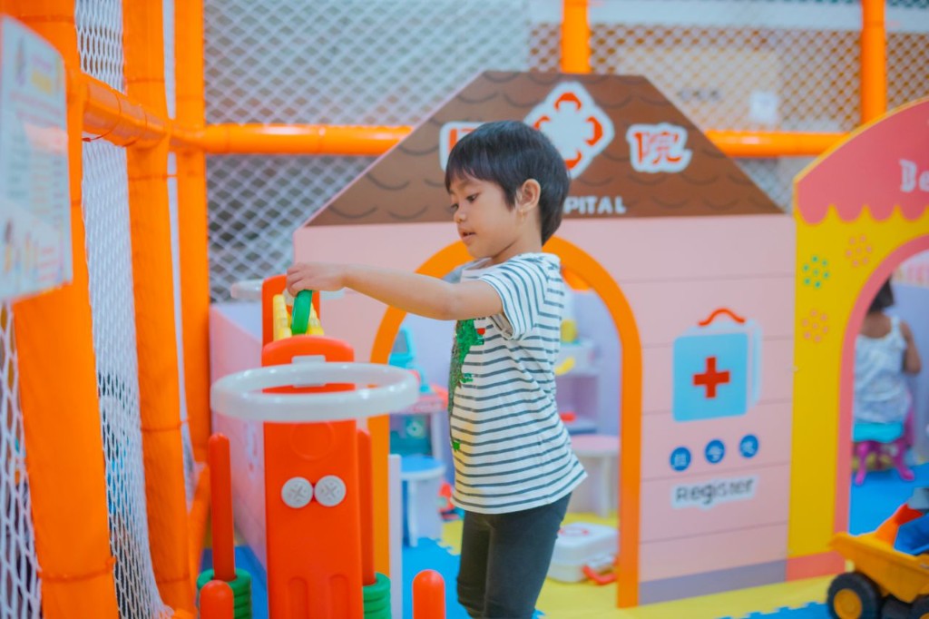 Child playing in a daycare play area